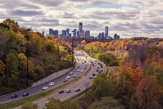 highway heading to a city