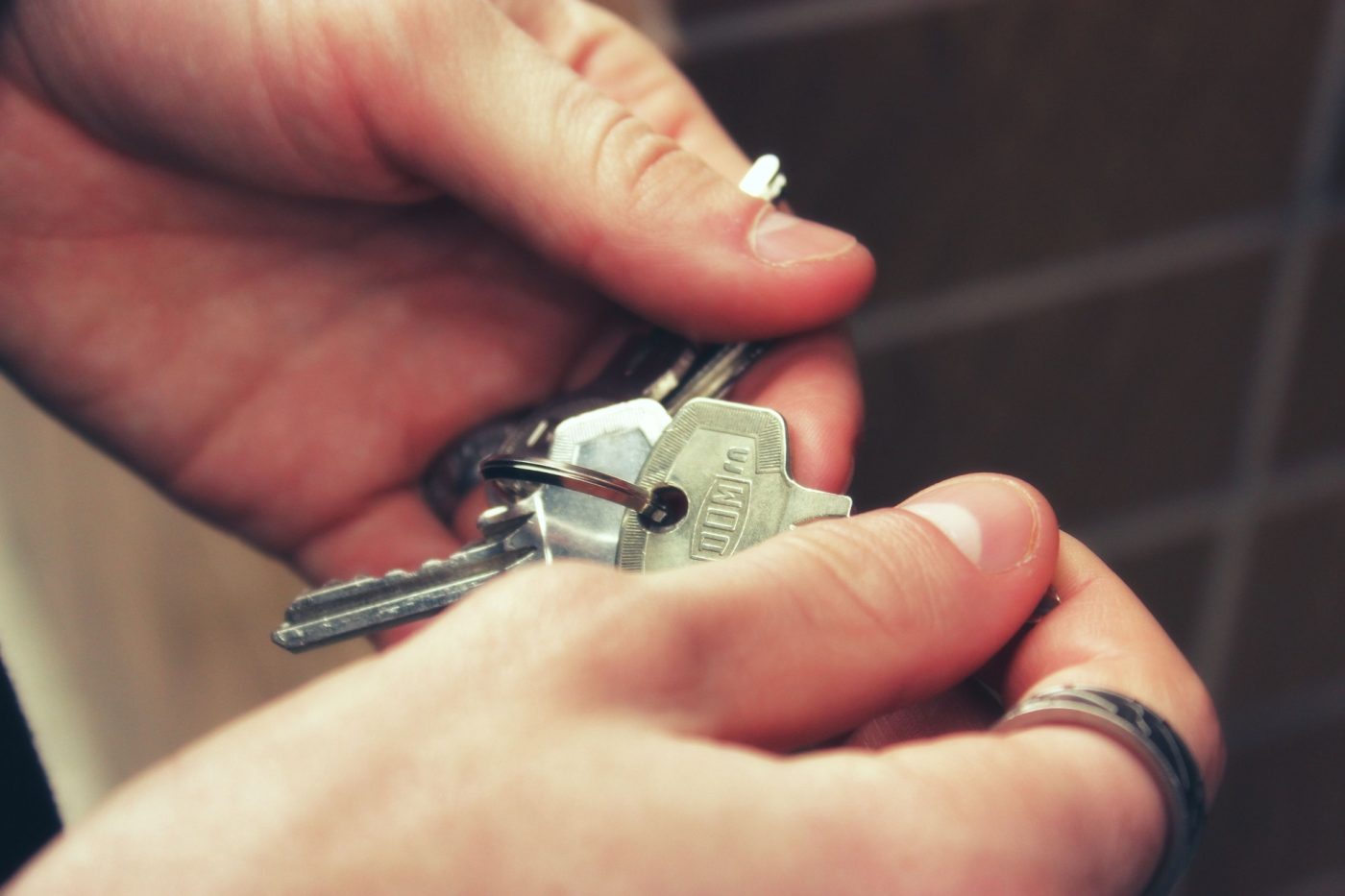 person holding keys