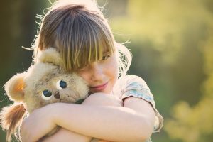 girl with teddy bear