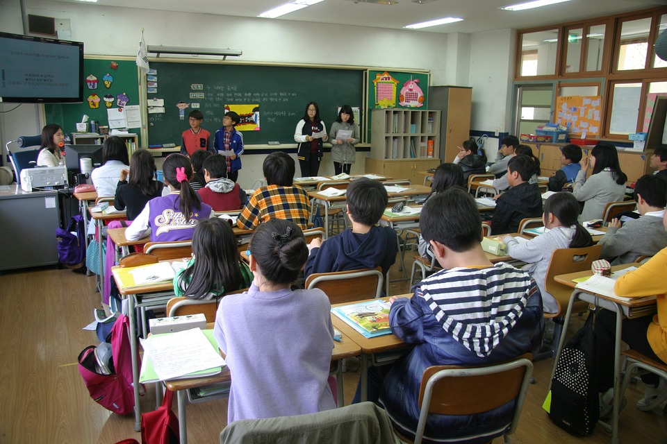 young kids sitting in class