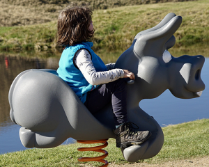 Child Playing on Playground