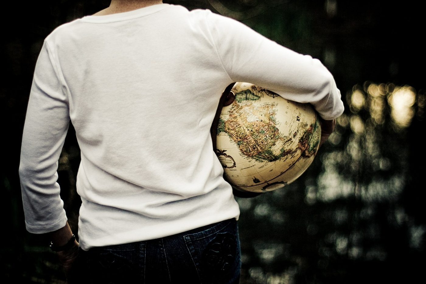 woman holding globe