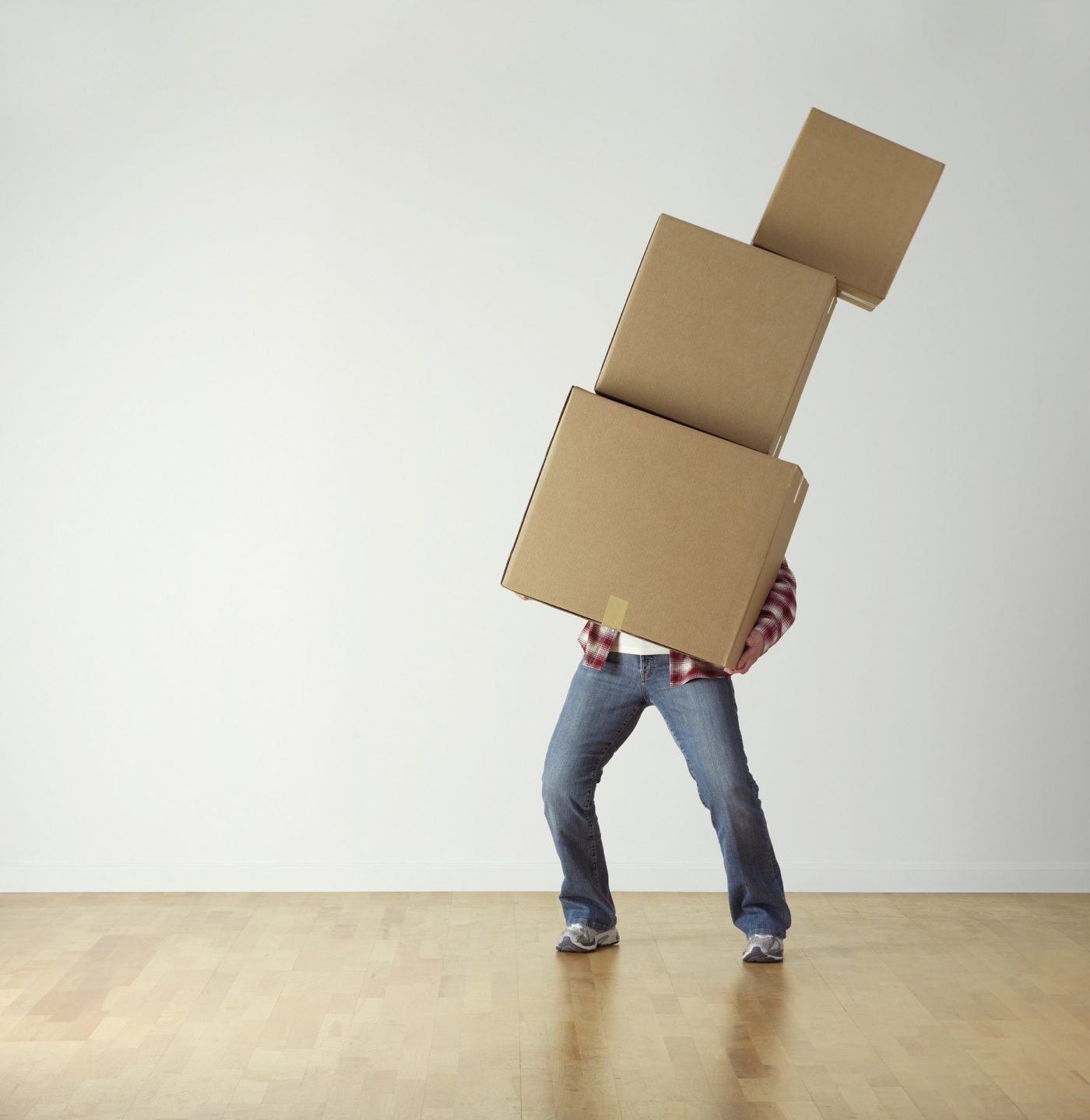 Man Carrying Three Boxes And Falling Over
