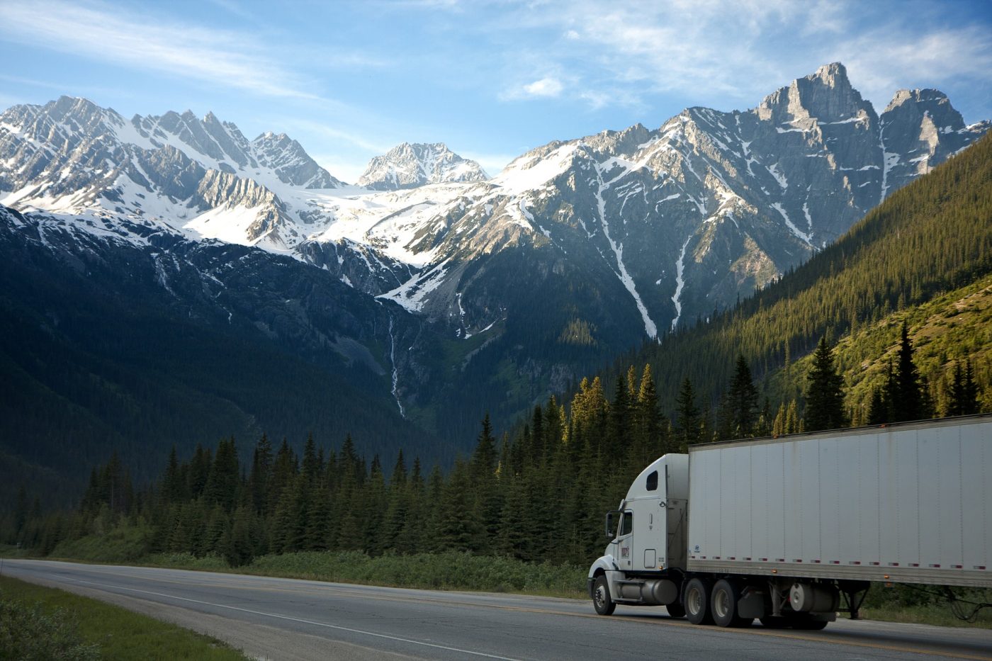 moving truck driving on highway