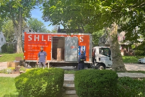 Shleppers Movers Outside by Truck