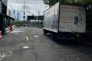 Shleppers white truck in city