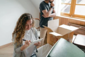 woman checking off moving list